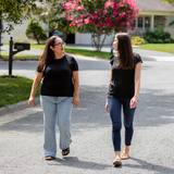 Two moms take a walk together